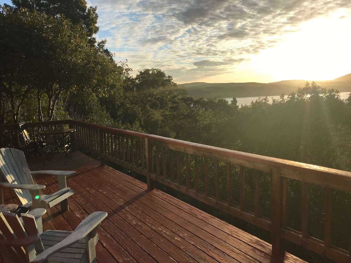 The view over Tomales Bay from a wooden balcony. 