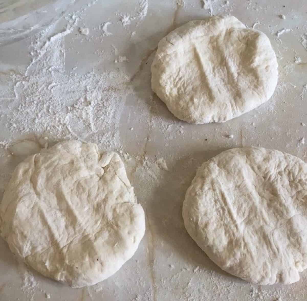Homemade flatbread dough to serve with broad bean dip