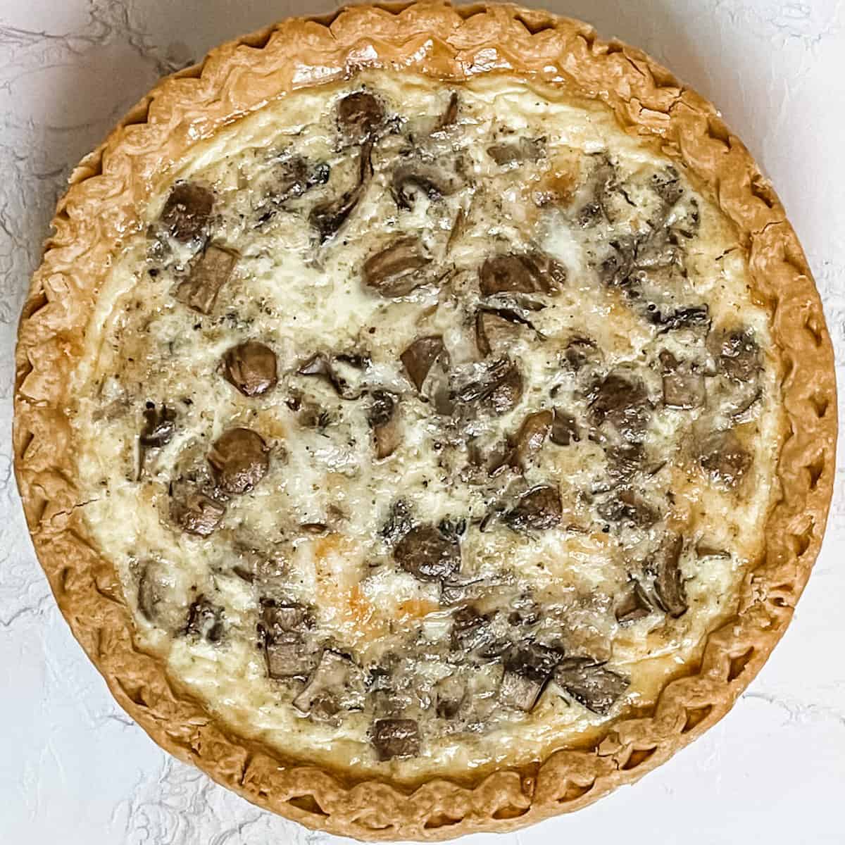 A cheese and mushroom quiche. 