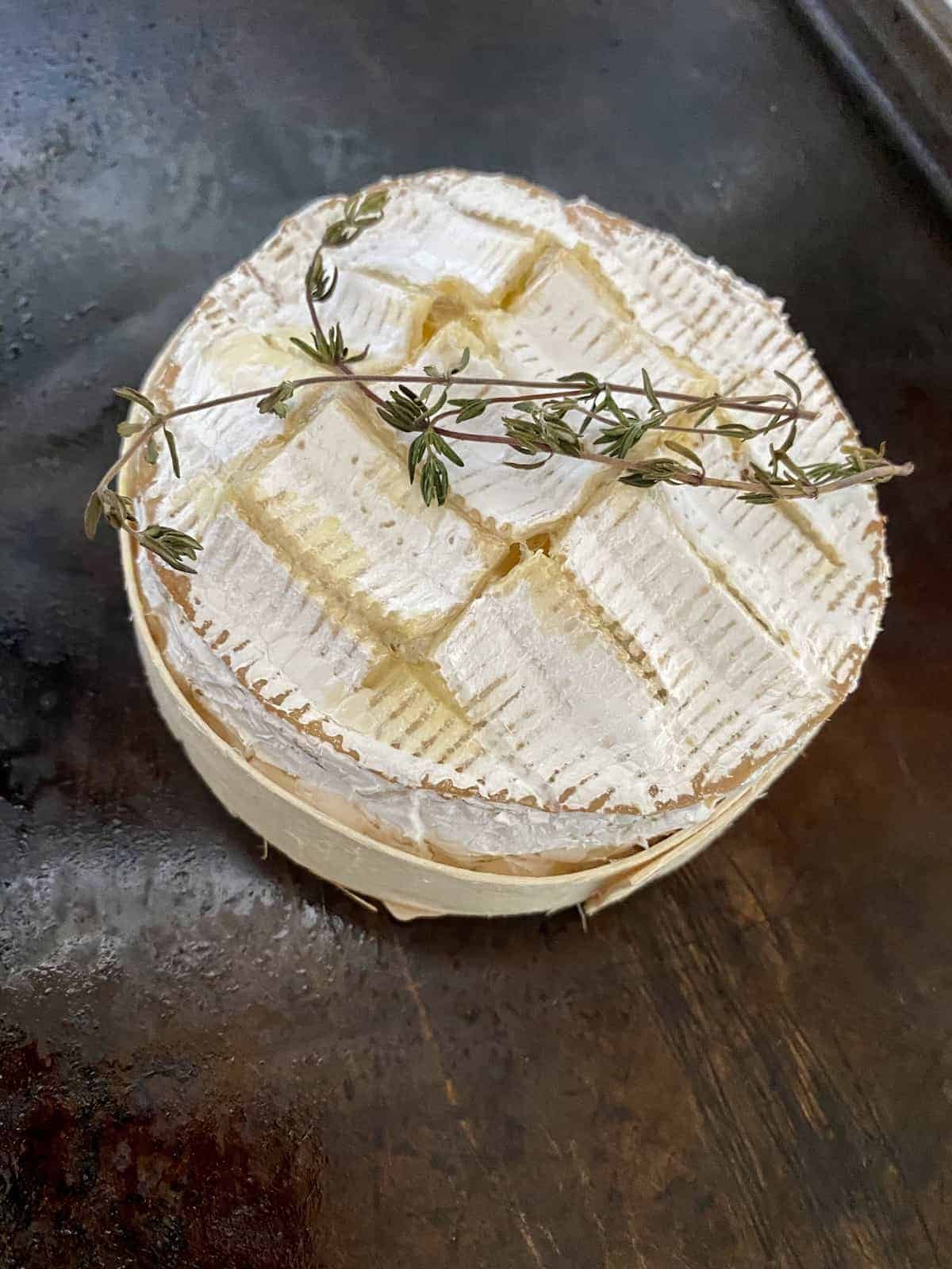 Bake the camembert in the oven on a tray 