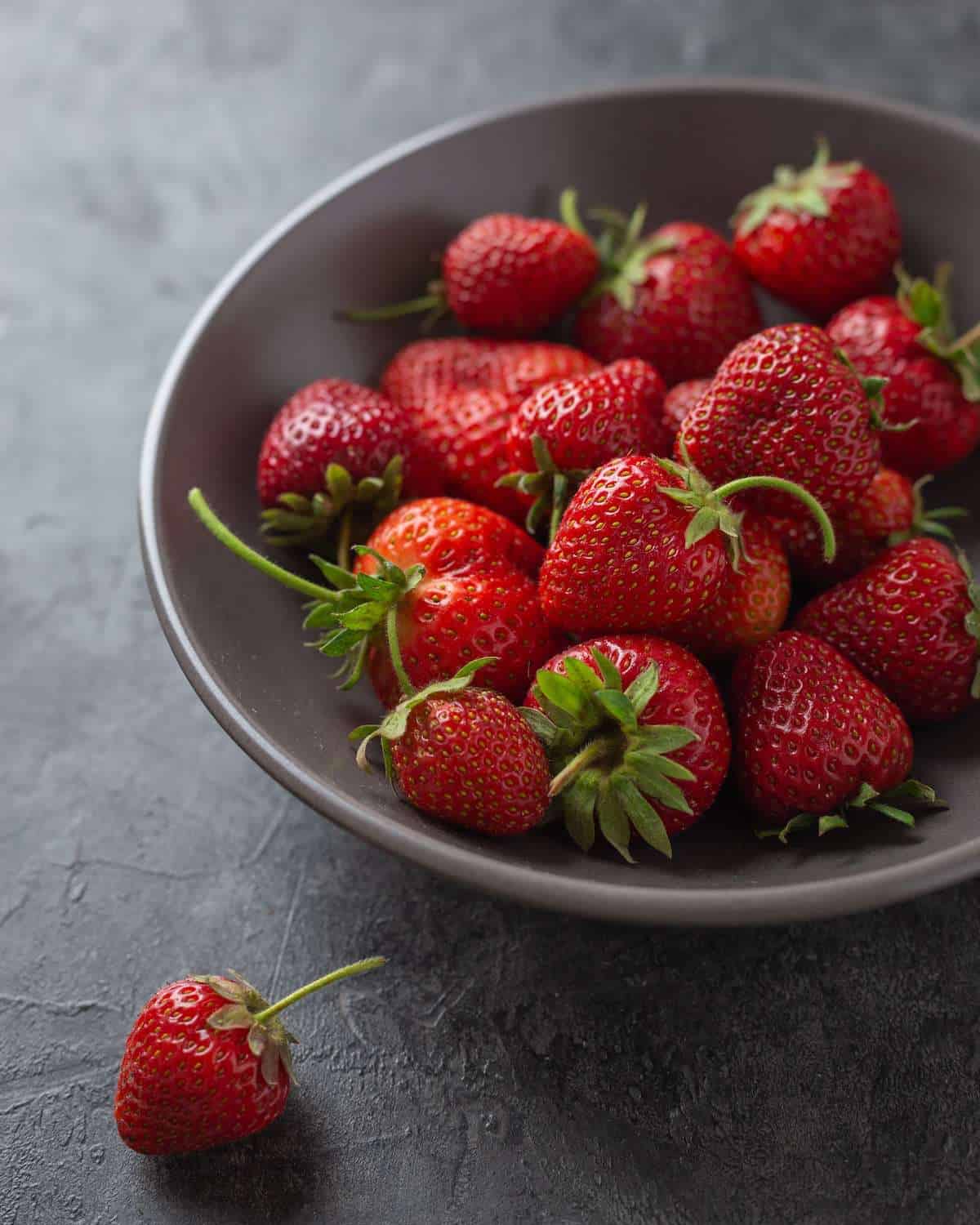 A bowl of strawberries. 