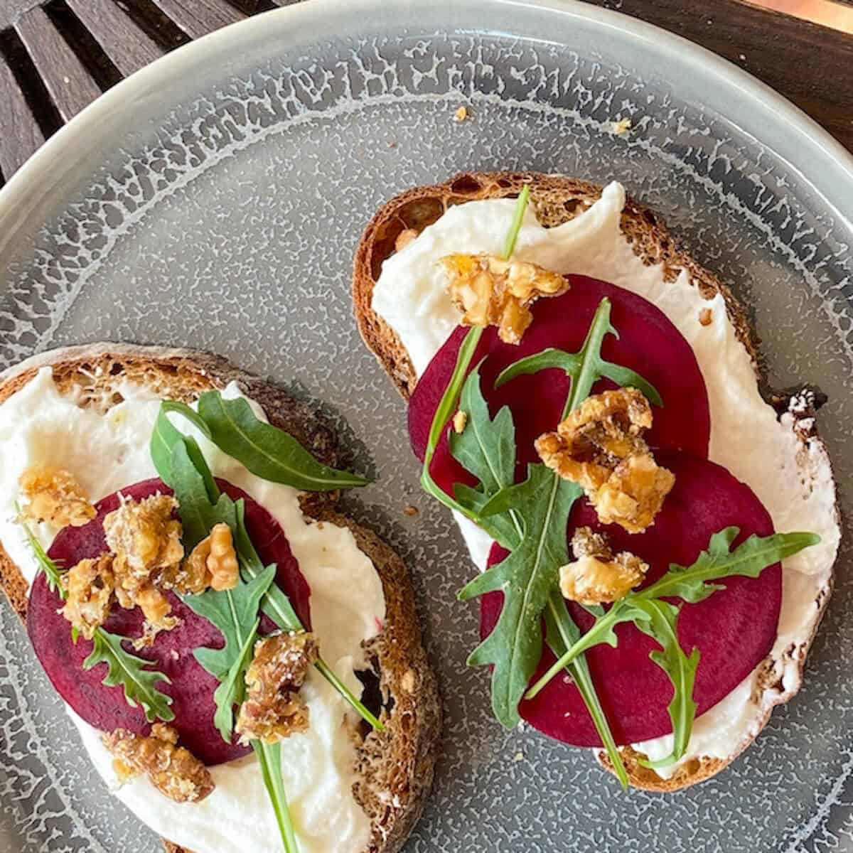 beetroot carpaccio and whipped goat cheese canape with caramelised walnuts