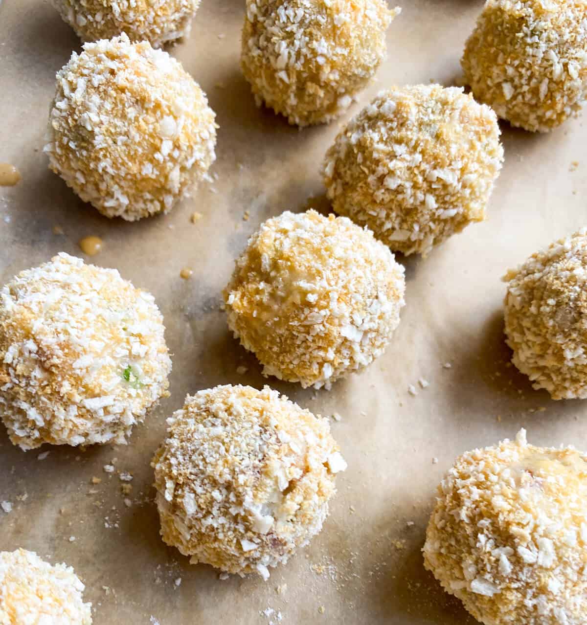 Smoked mackerel croquettes with panko breadcrumbs ready to be fried