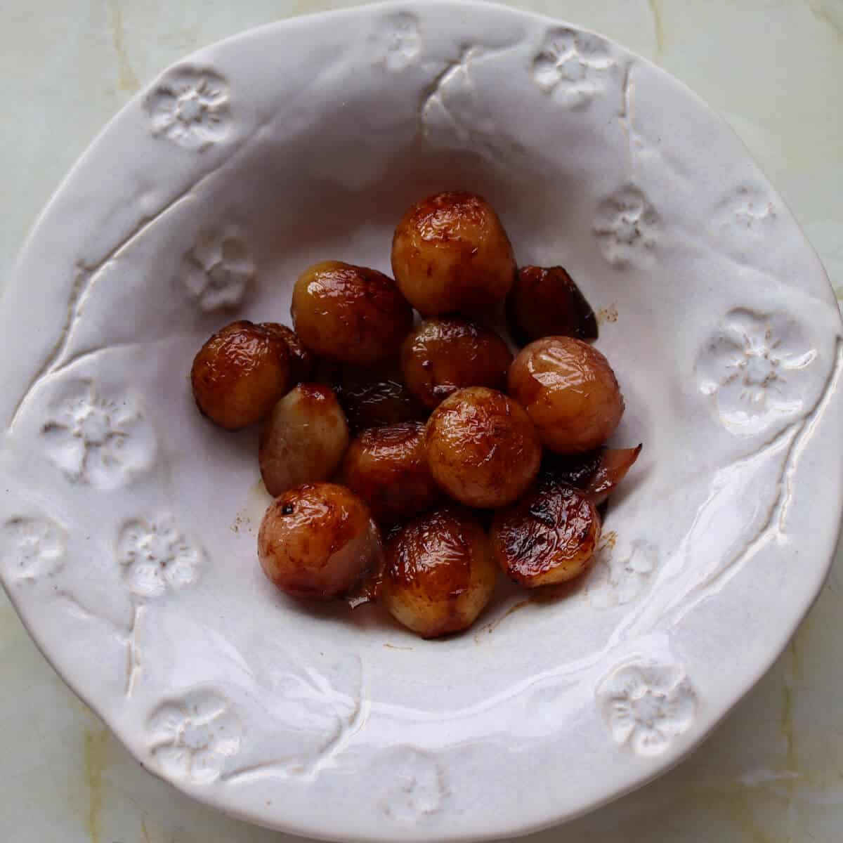 sticky balsamic shallots in a serving bowl