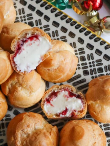 Cranberry and whipped brie Christmas profiteroles.