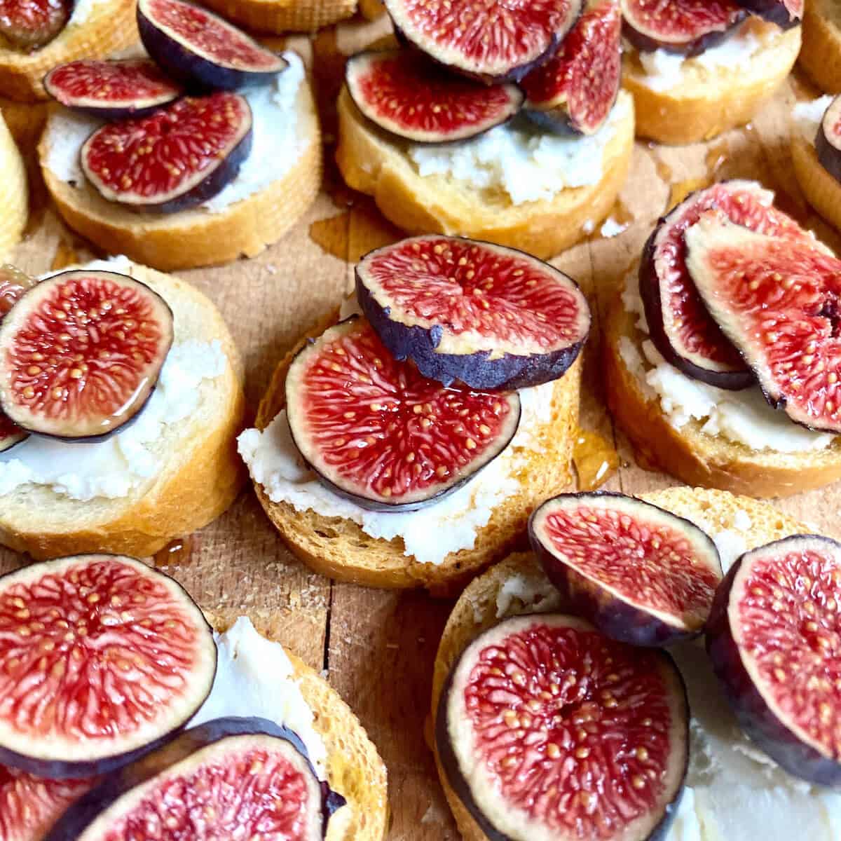 Goat cheese and figs on crostini at a French wines and cheese tasting event.