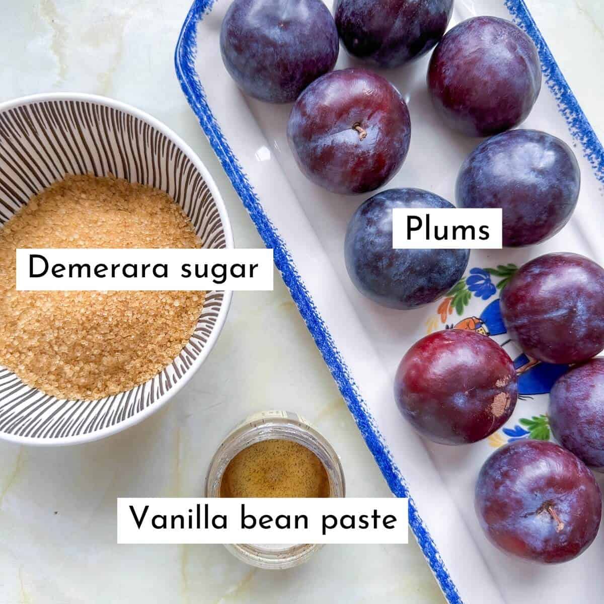 Ingredients for plum crumble filling: plums, Demerara sugar and vanilla bean paste. 
