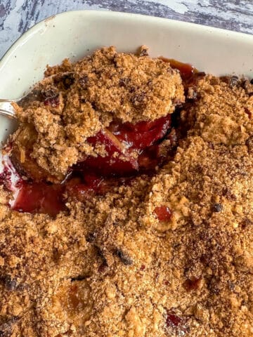 Plum crumble with pecan topping.