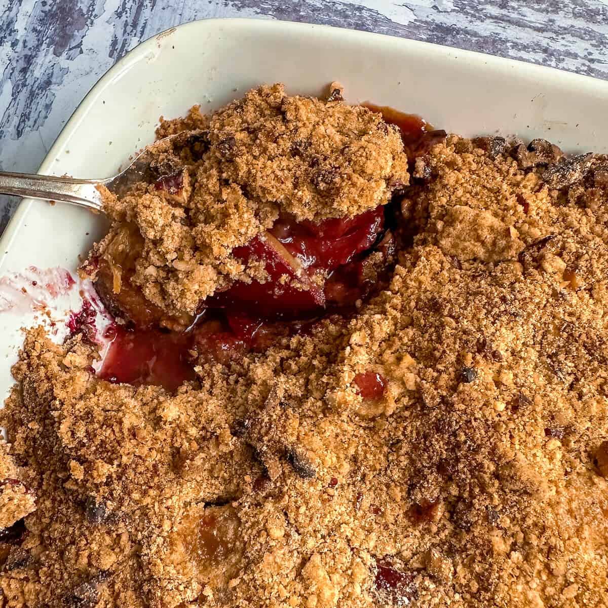 Plum crumble with pecan topping.