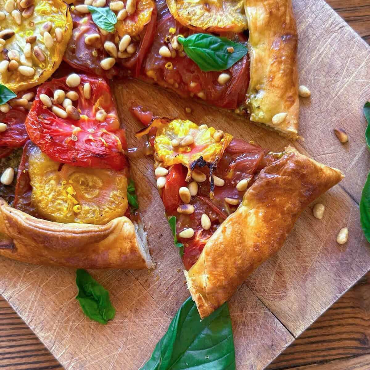 A close up of a slice of tomato galette.