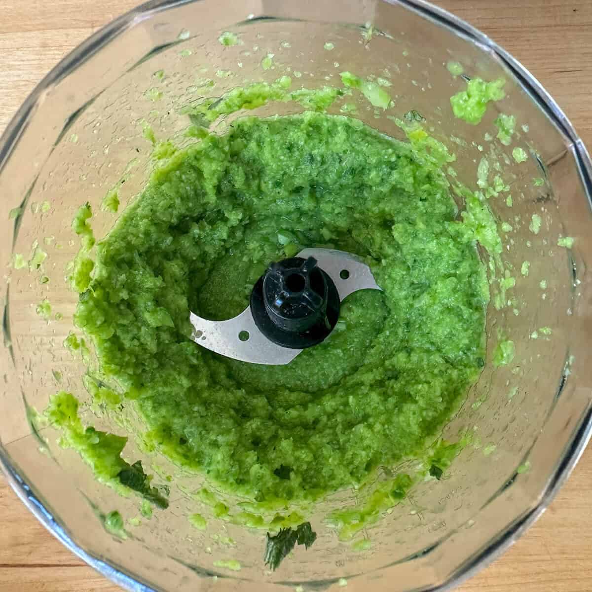 A spring vegetable puree in a blender. 