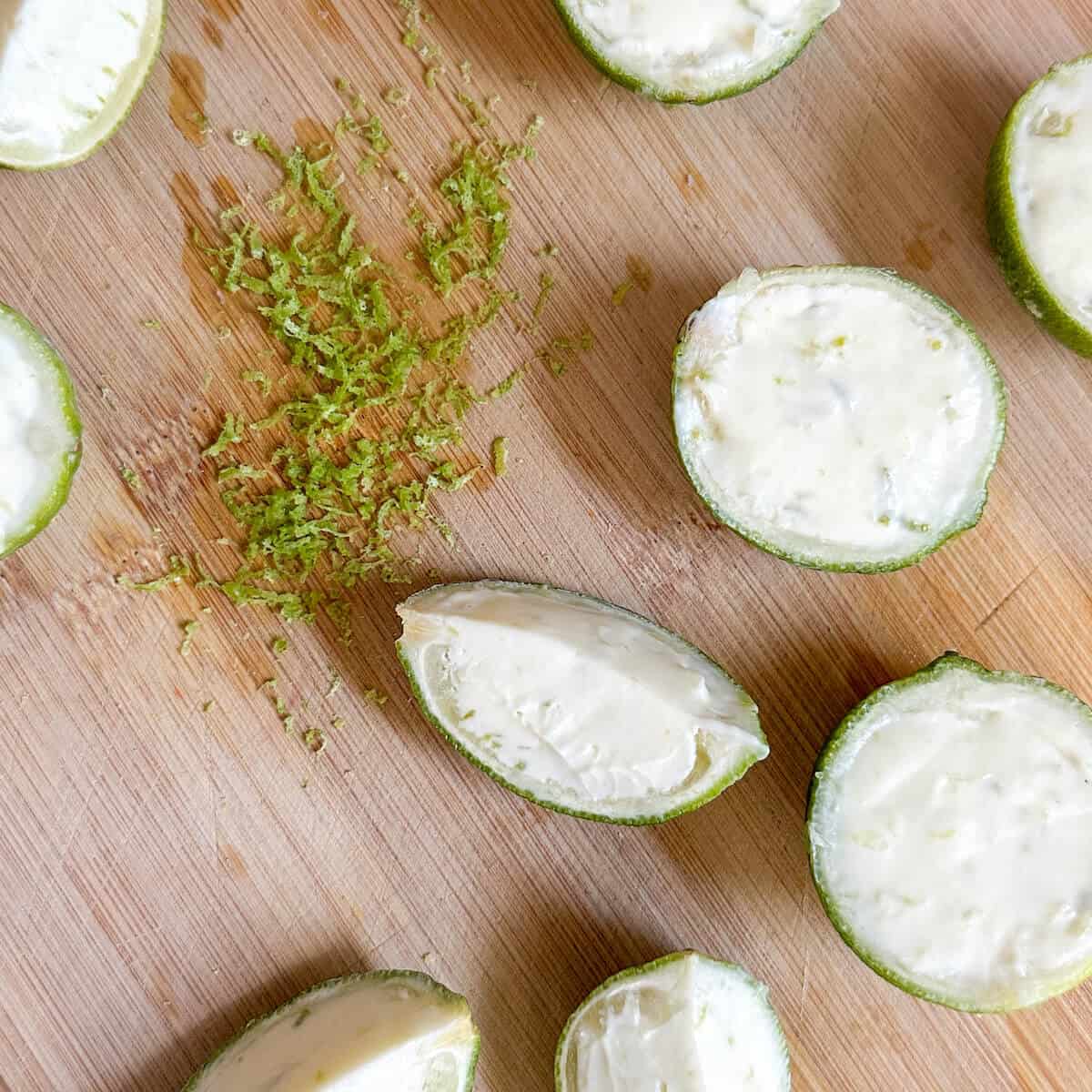 Frozen lime ice cream wedges on a chopping board. 