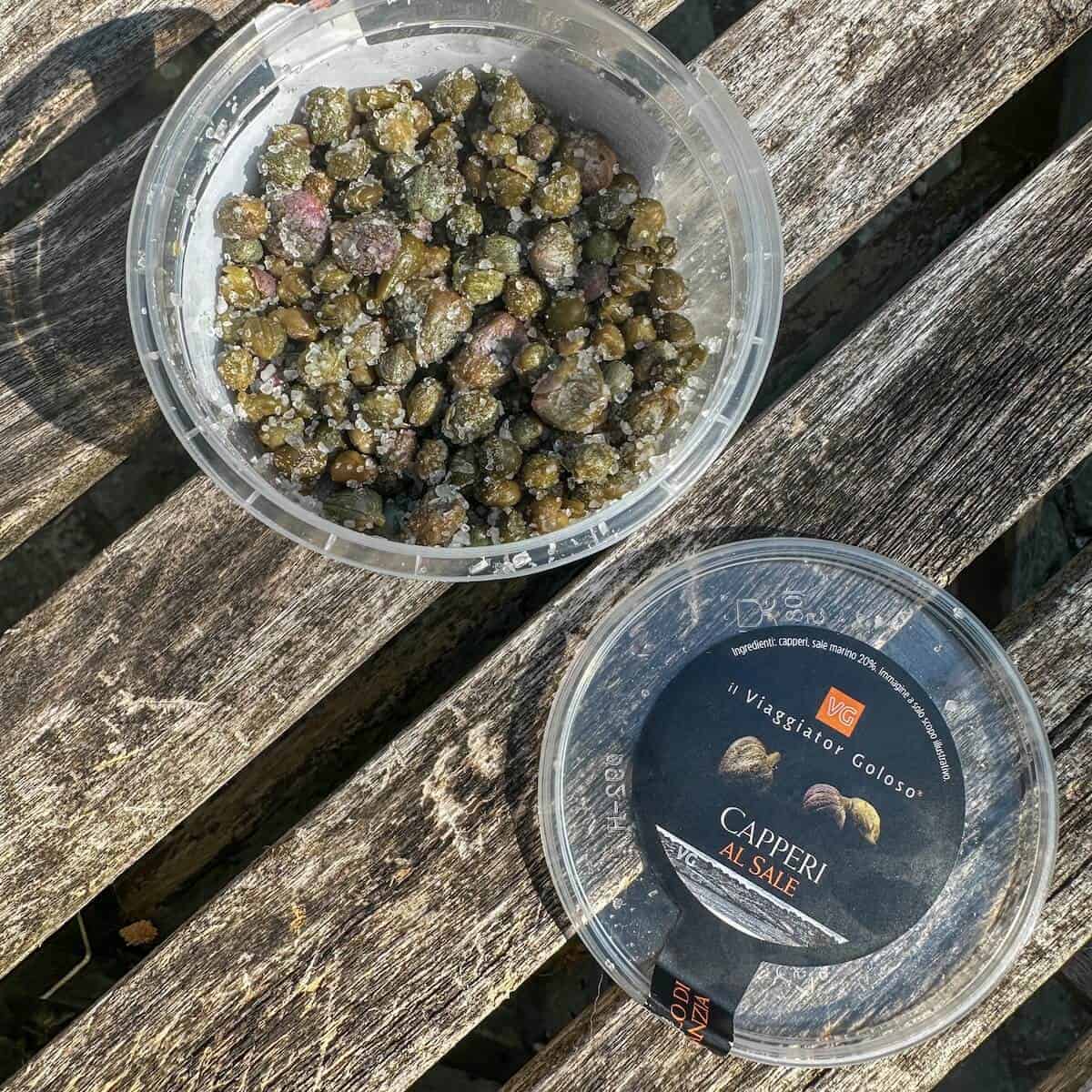 Salted capers in a container. 
