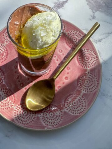 Chocolate olive oil mousse with cardamom Chantilly cream and flaky sea salt.
