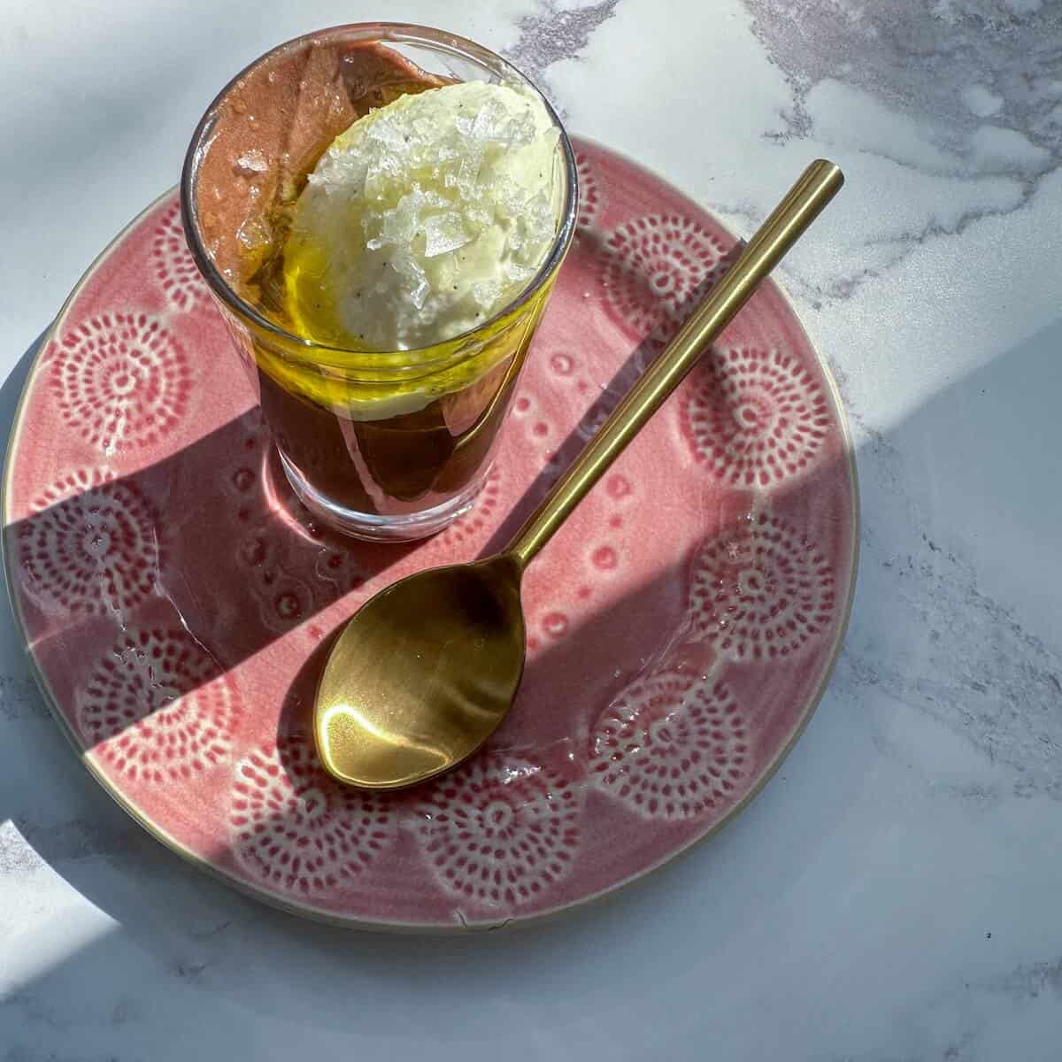 Chocolate olive oil mousse with cardamom Chantilly cream and flaky sea salt.