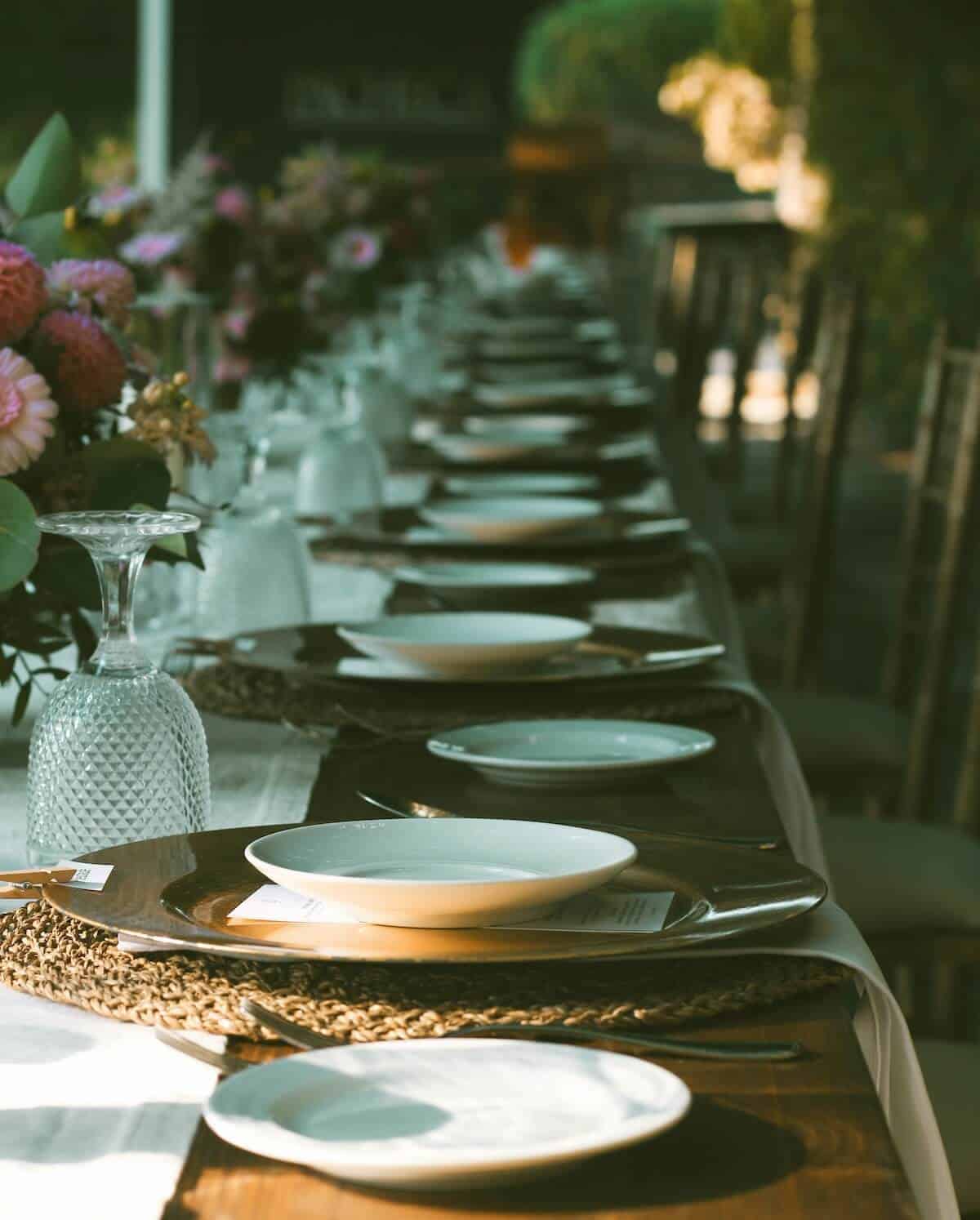 A formal dining table with a runner.