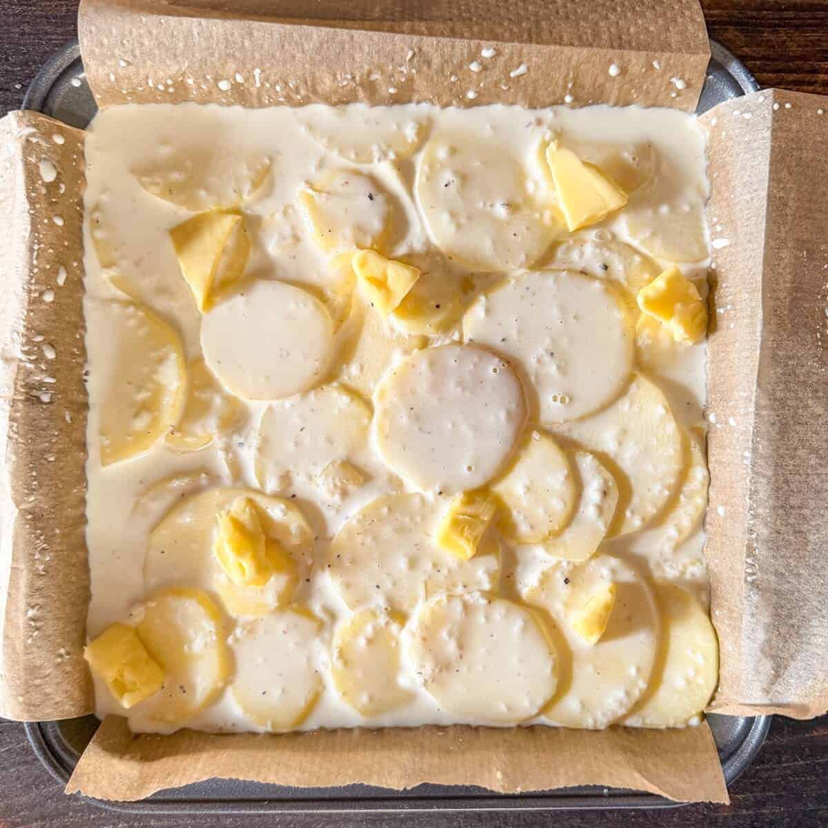 A layered potato dauphinoise about to go in the oven.